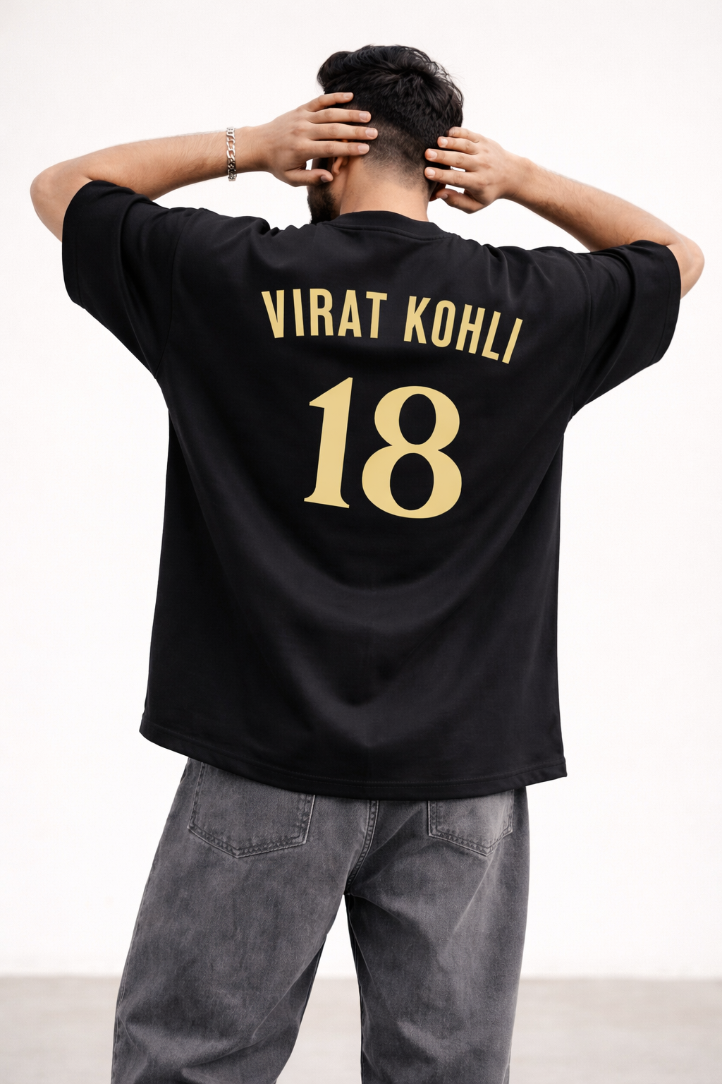 RCB Legacy Star Oversized Tee – Black Gold Edition